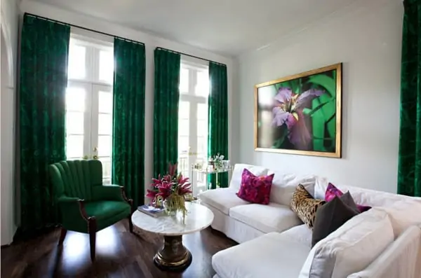 Velvet curtains help protect the room from scorching sunlight