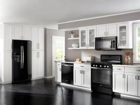 kitchen color schemes with black appliances top image