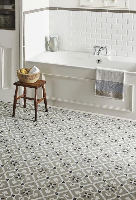 matching floor and wall tile color in bathroom