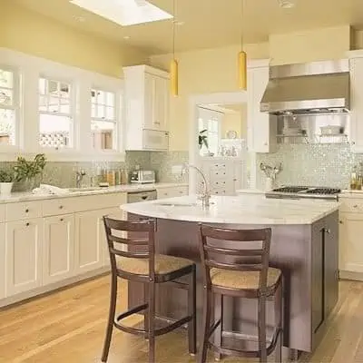 pale yellow kitchen walls with white cabinets